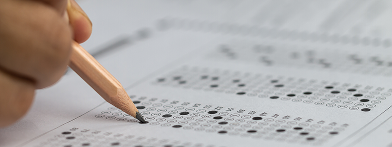 Person filling out a Scantron test